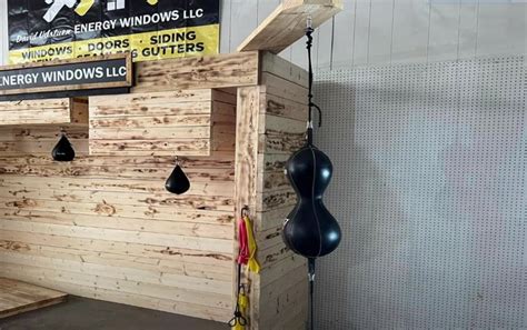 two metal poles to hld boxing setup|30 DIY Speed Bag Platform Ideas For Punching Fans.